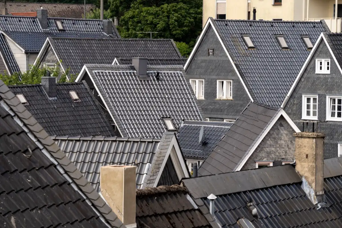 Steep roof eaves and gutter lines on houses in Fontana, CA